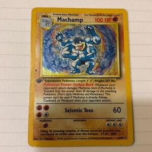 Pokémon 1st Edition Machamp hologram card.